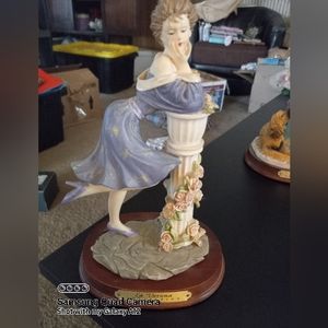 LA Verona girl statue 6 and 1/2 in.tall.